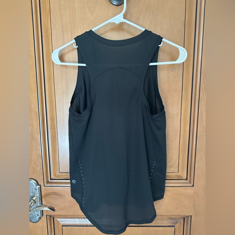 black lulu tank with mesh like top design, excellent condition